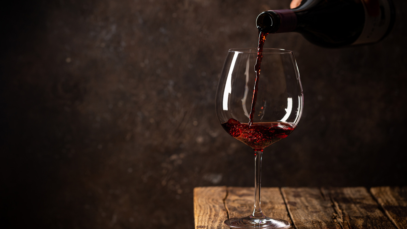 The Reason Fancy Restaurants Prime Your Wine Glass