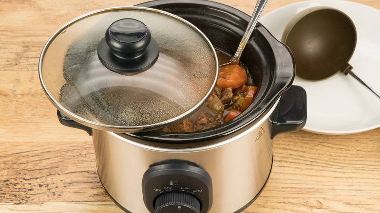 slow cooker with food inside
