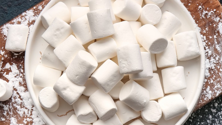 bowl of marshmallows on wood