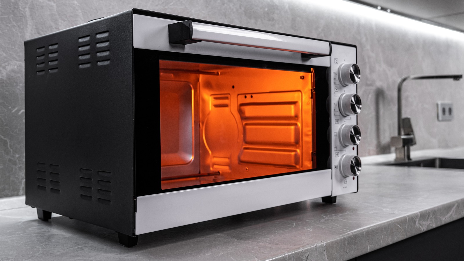 The Reason Toaster Ovens Cook Food More Slowly Than Microwaves