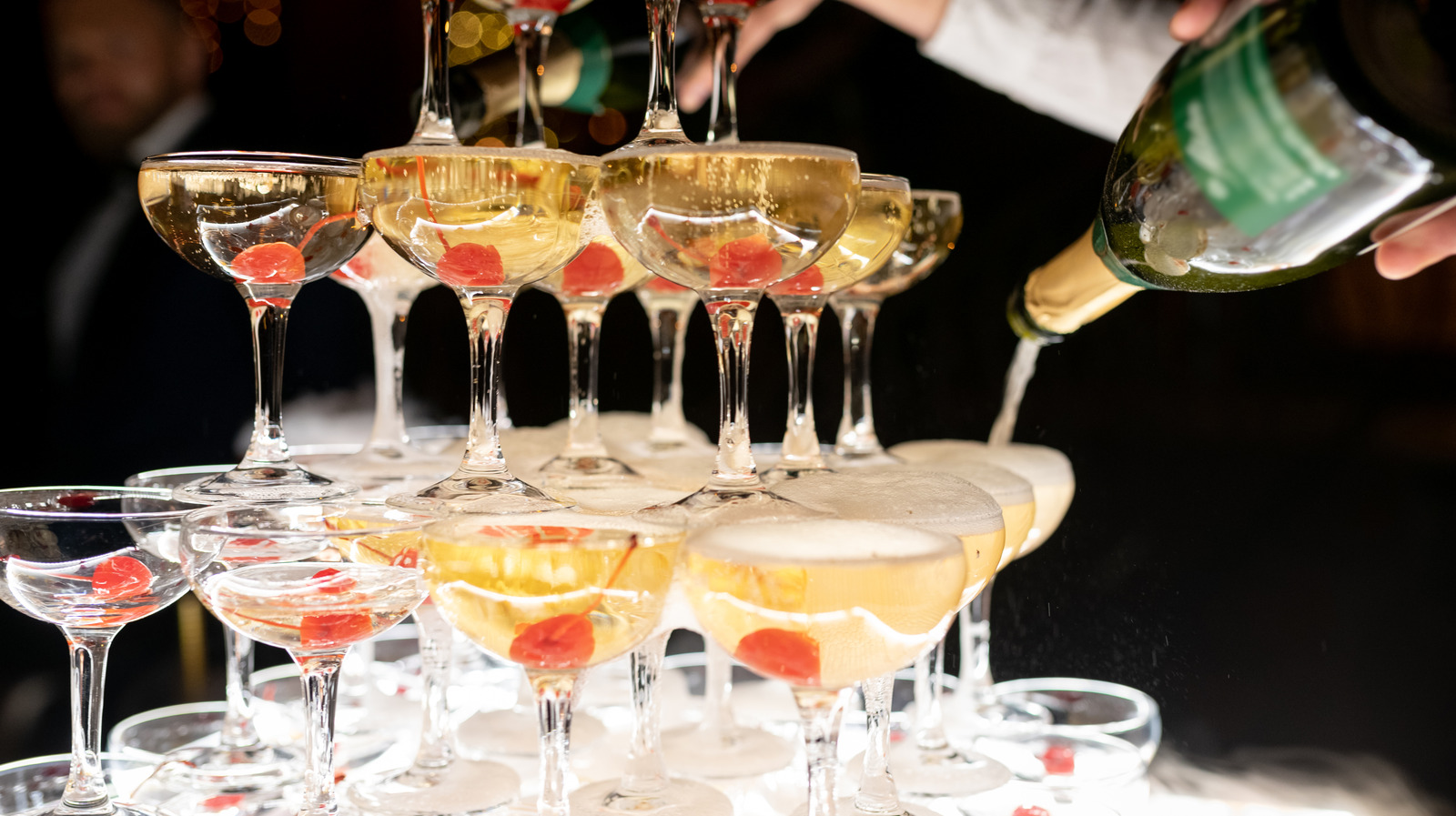 The Reason Coupe Glasses Are Used For Champagne Towers