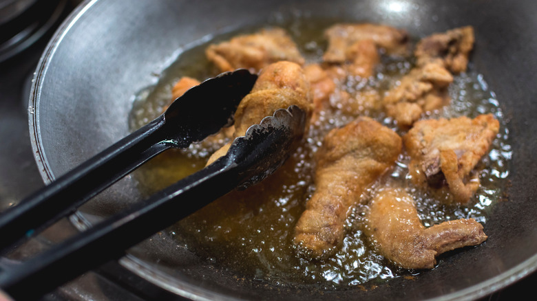 Fried chicken in a wok 