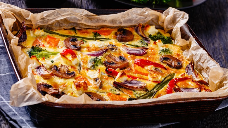 Eggs with vegetables on sheet pan