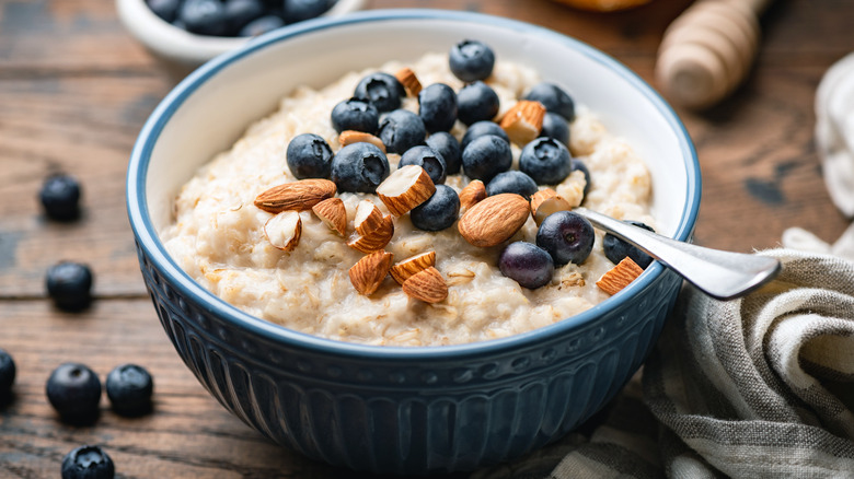 bowl of oatmeal with blueberries and almonds