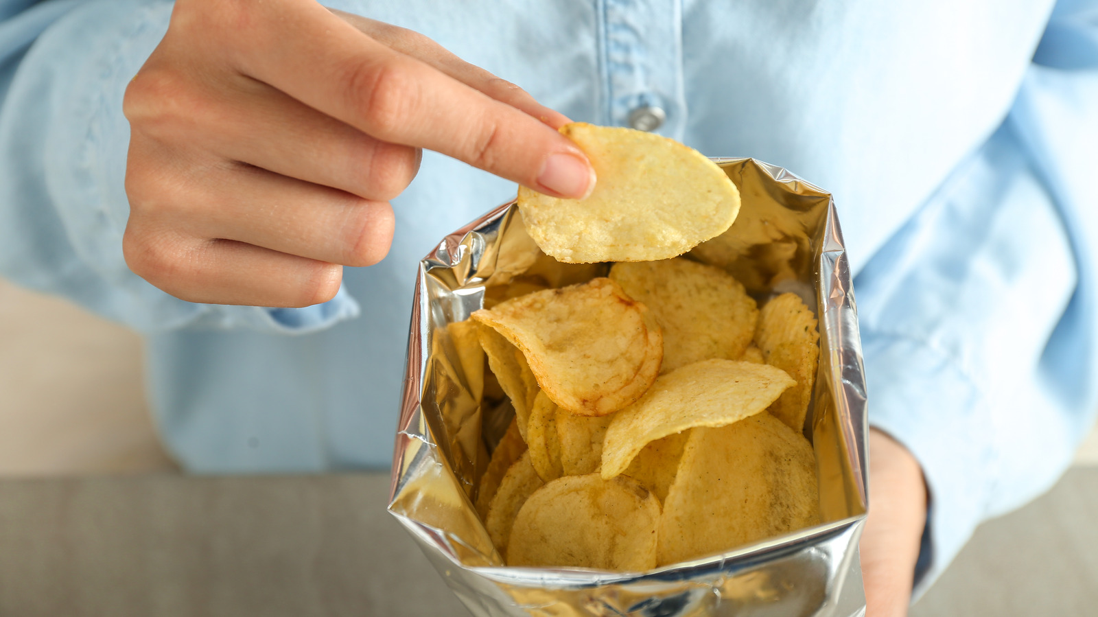 4,500+ Potato Chip Bag Stock Photos, Pictures & Royalty-Free Images -  iStock | Potato chip bag isolated, Empty potato chip bag, Hand in potato  chip bag
