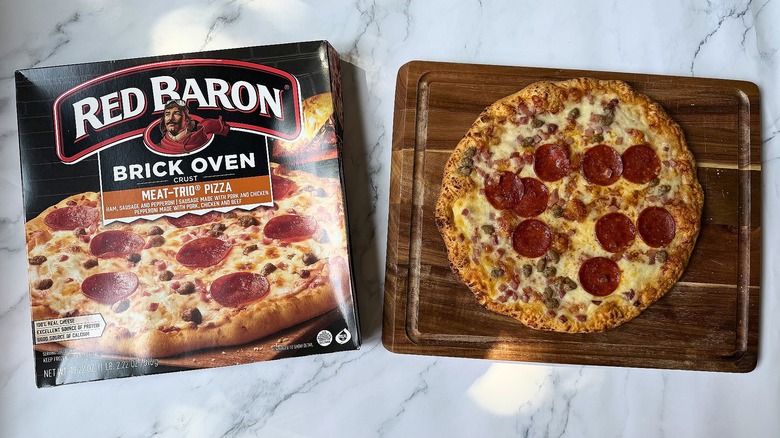 Red Baron Meat-Trio pizza cooked and with the box