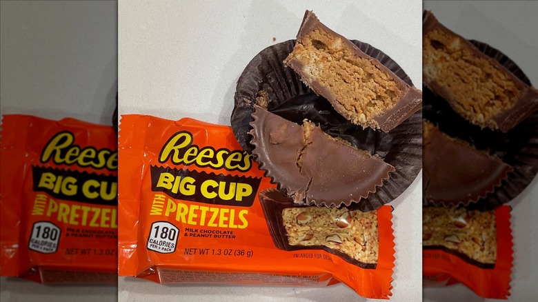 Reese's Pretzel Big Cup cut in half on table