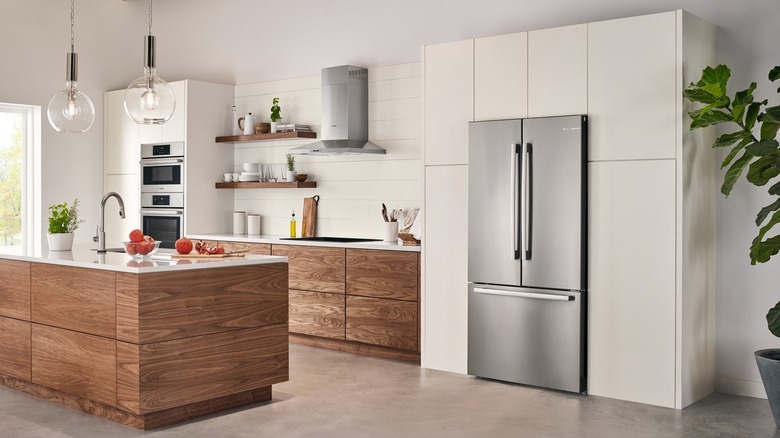 Stainless steel Bosch French door refrigerator in a contemporary kitchen