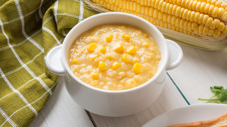 Tureen of creamed corn on a kitchen countertop