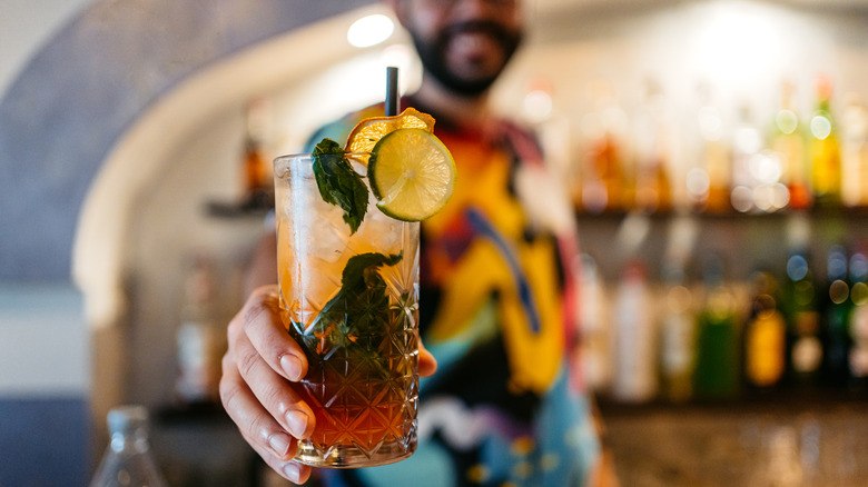 bartender serving a cocktail