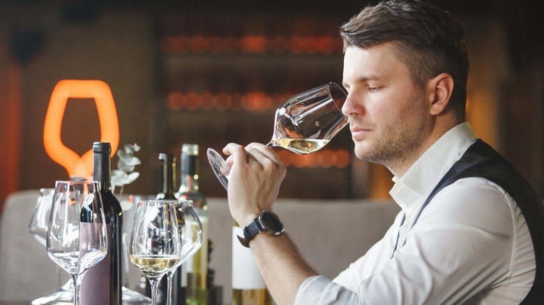 sommelier smelling wines
