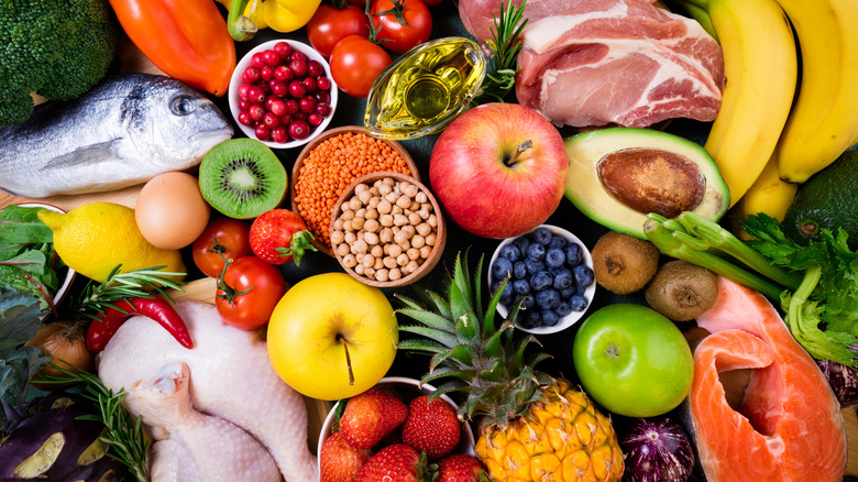 Assortment of fruit and raw meats.