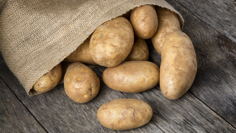 russet potatoes in burlap bag