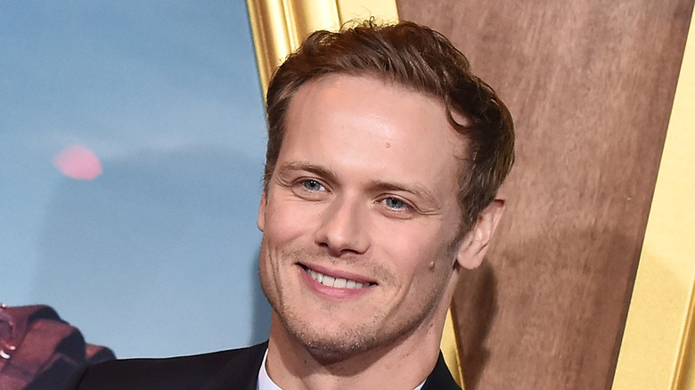 Outlander's Sam Heughan smiling