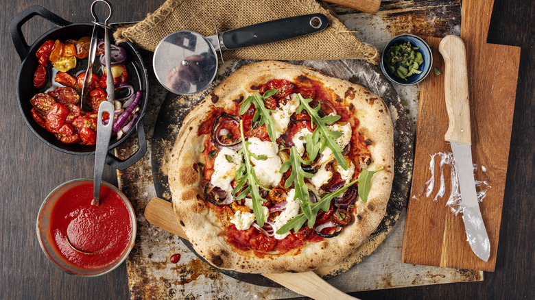 Pizza with burrata and arugula