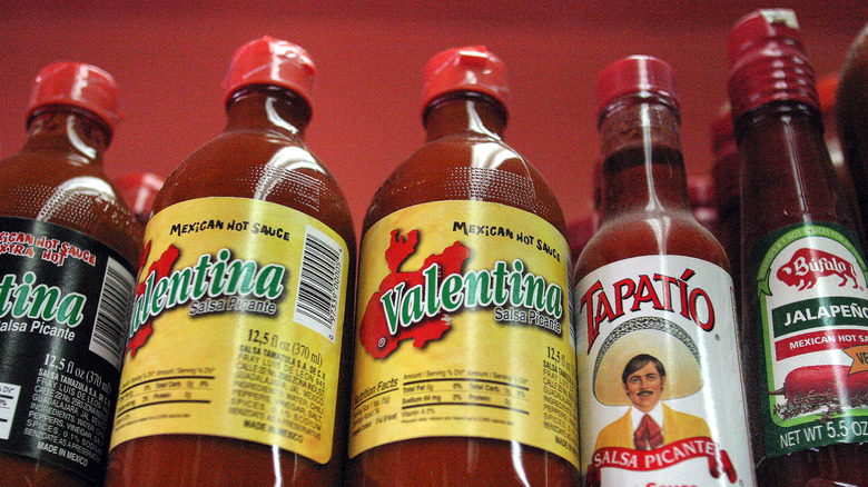 different bottles of all purpose hot sauces