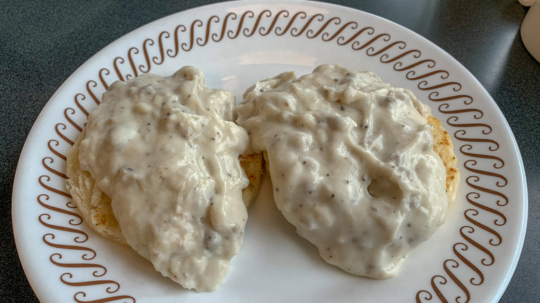 biscuits and gravy on a plate at Waffle House
