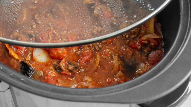 slow cooker in use with lid