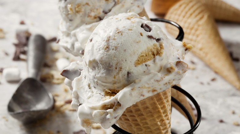 a scoop of chocolate chip cookie dough ice cream with scooper