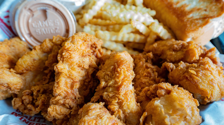 Raising Cane's chicken fingers with fries and sauce
