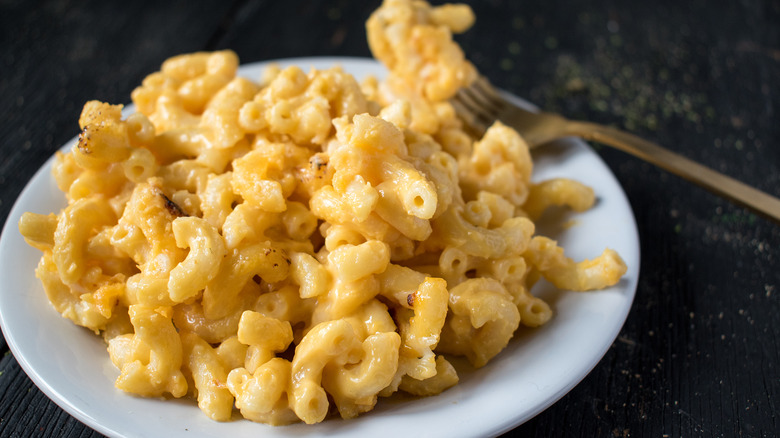 bowl of macaroni and cheese with seasoning