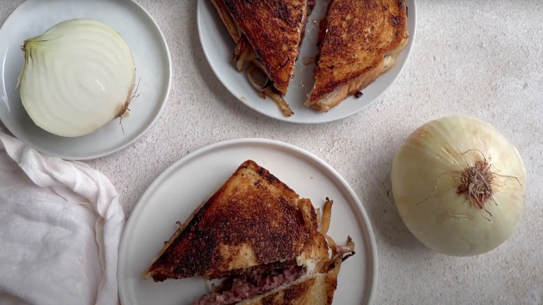 patty melt with onions on plate