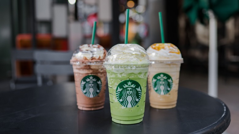 Three Starbucks frappuccinos on table
