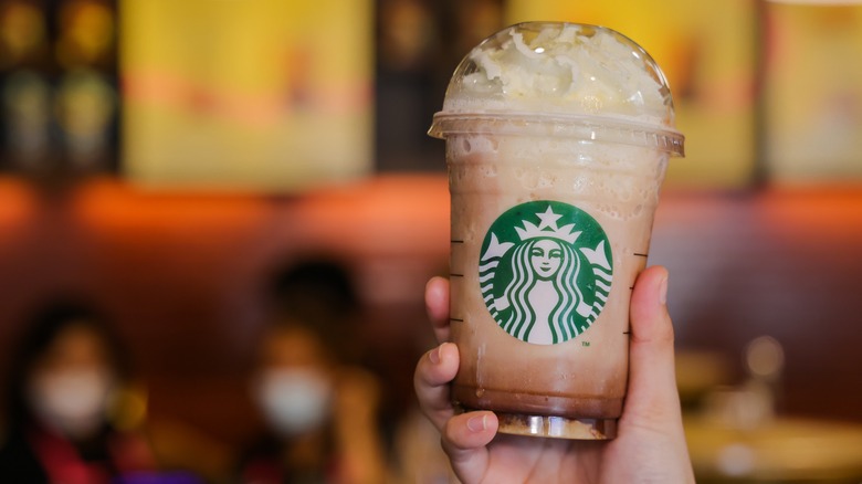Starbucks Frappuccino in a hand