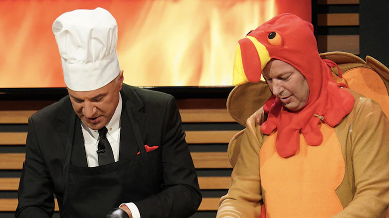 Kevin O'Leary with a man in a turkey costume