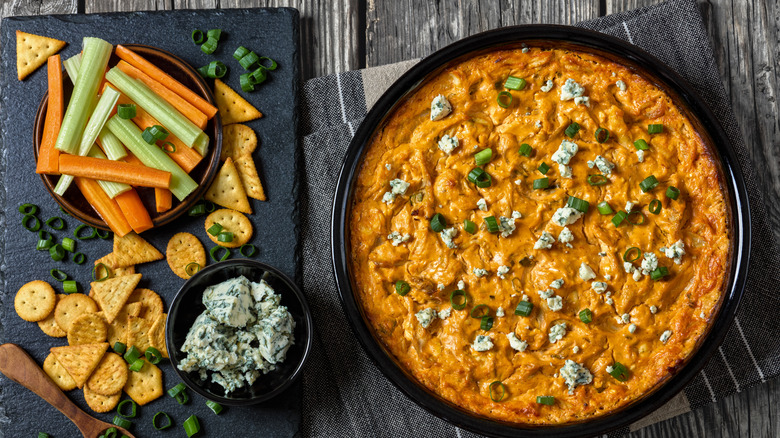 overhead of buffalo chicken dip with blue cheese.