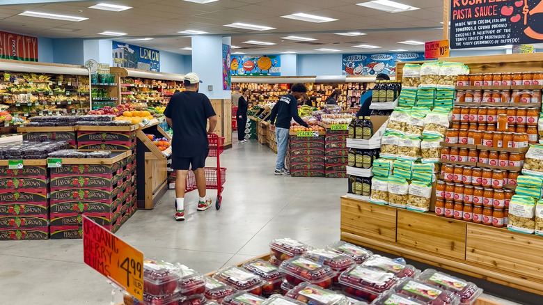 people shopping in a Trader Joe's store