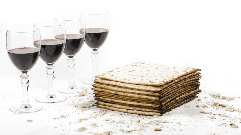 Four glasses of wine and matzah