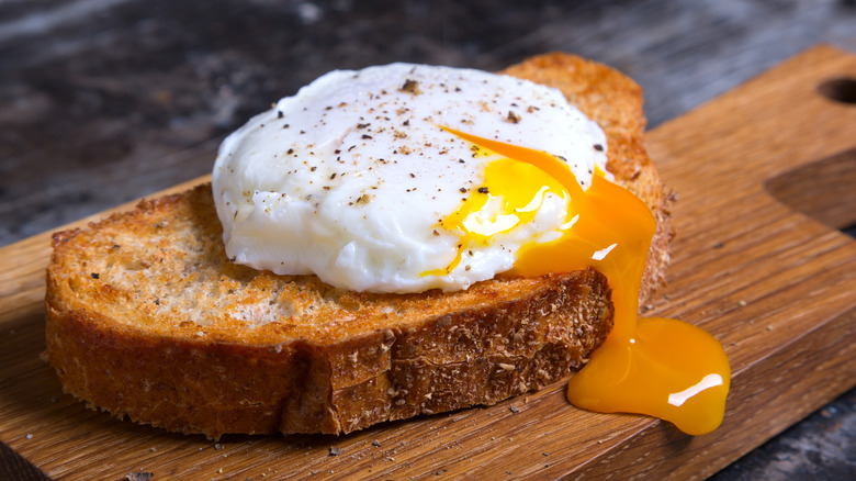 egg yolk running over toast