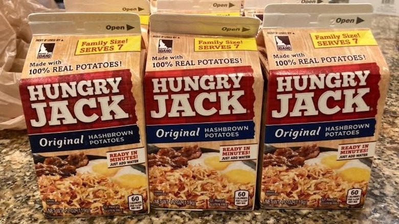 Containers of Hungry Jack Dehydrated Potatoes for hash browns