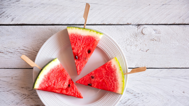 Watermelon wedges with popsicle stucks