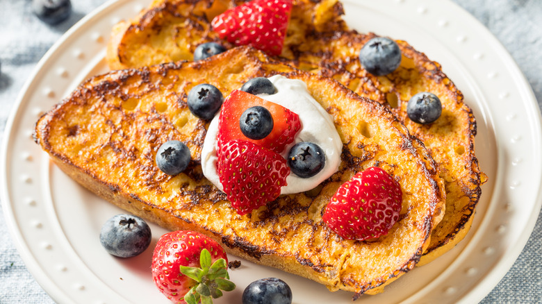 french toast covered in berries