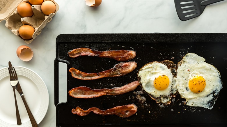 Cooking breakfast on cast iron griddle