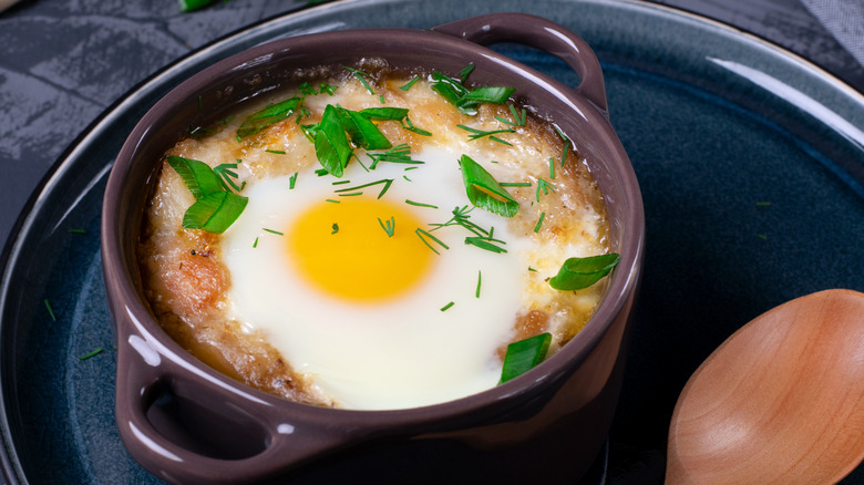 Egg en cocotte with fresh herbs