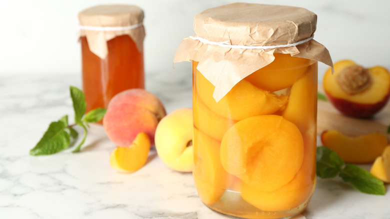 cut peaches in jar