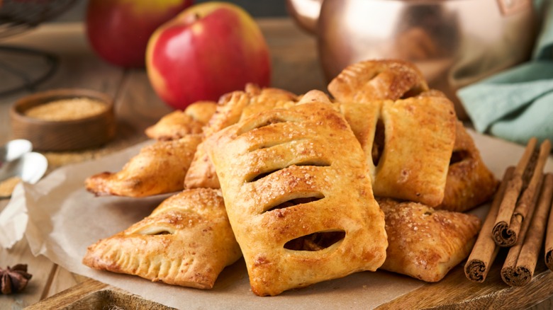 mini apple pies with sugar on crust
