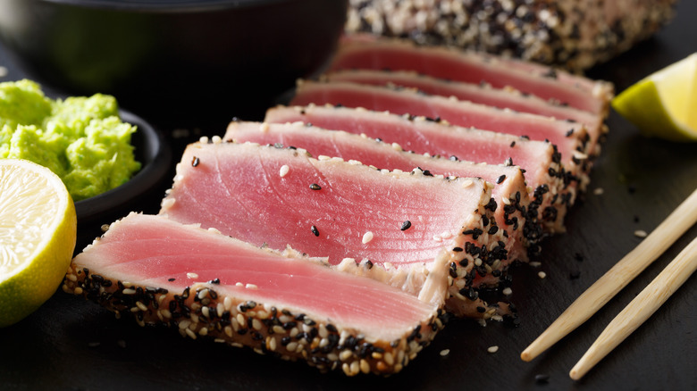 Tuna steak on black plate