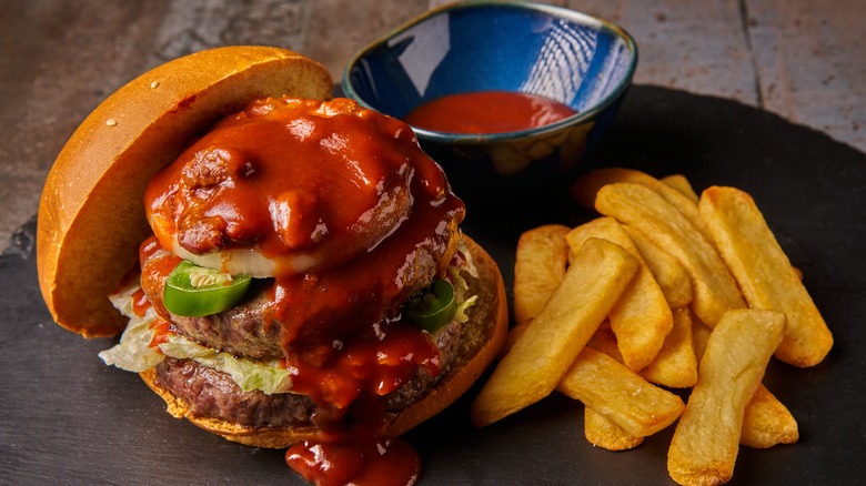 burger with sauce and fries
