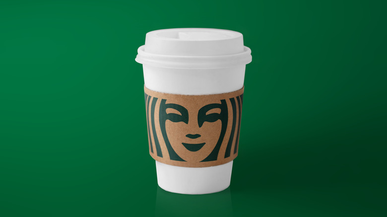 Starbucks cup with green background