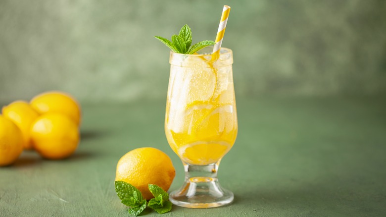 glass of limoncello and lemons
