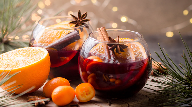 winter cocktails with cinnamon and oranges