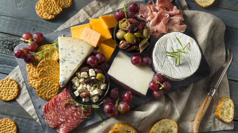 Fancy charcuterie board with cheese