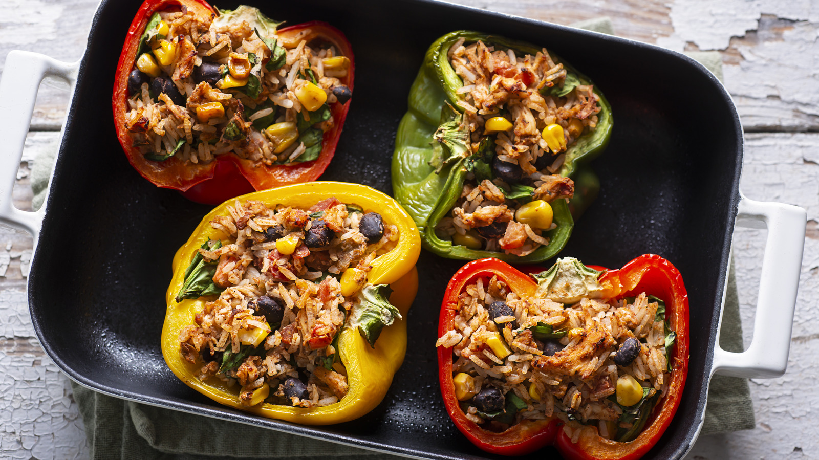 The Spicy Twist On Stuffed Peppers That'll Upgrade Your Weeknight Dinner