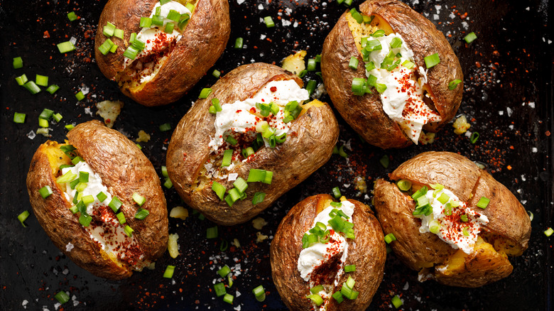 baked potatoes loaded with toppings