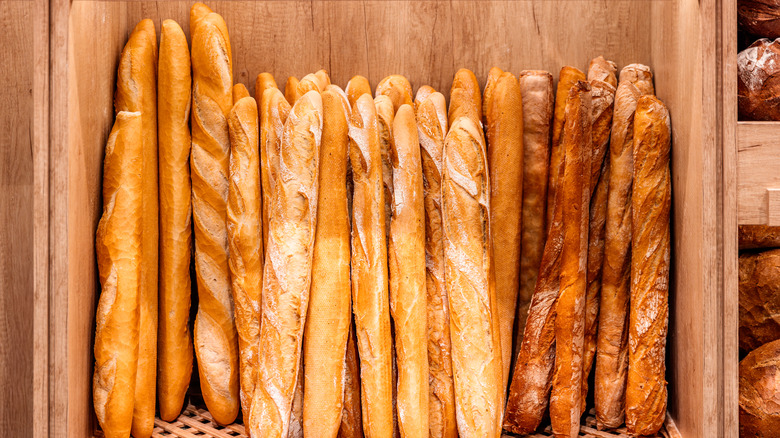 Overhead view of baguettes in box