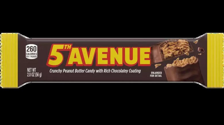 a 5th avenue candy bar with brown and yellow wrapping